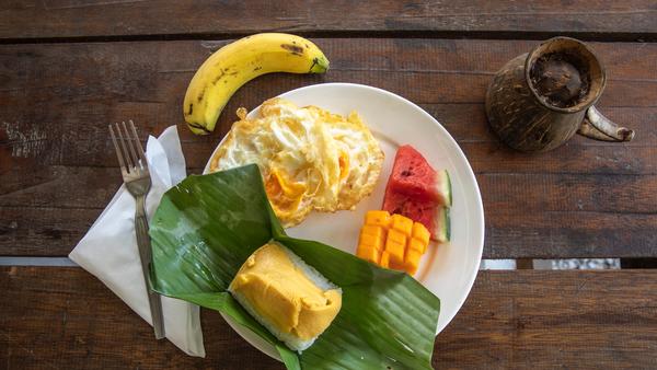 Travel writer Genevieve Hathaway explores what's on global plates for first meals of the day